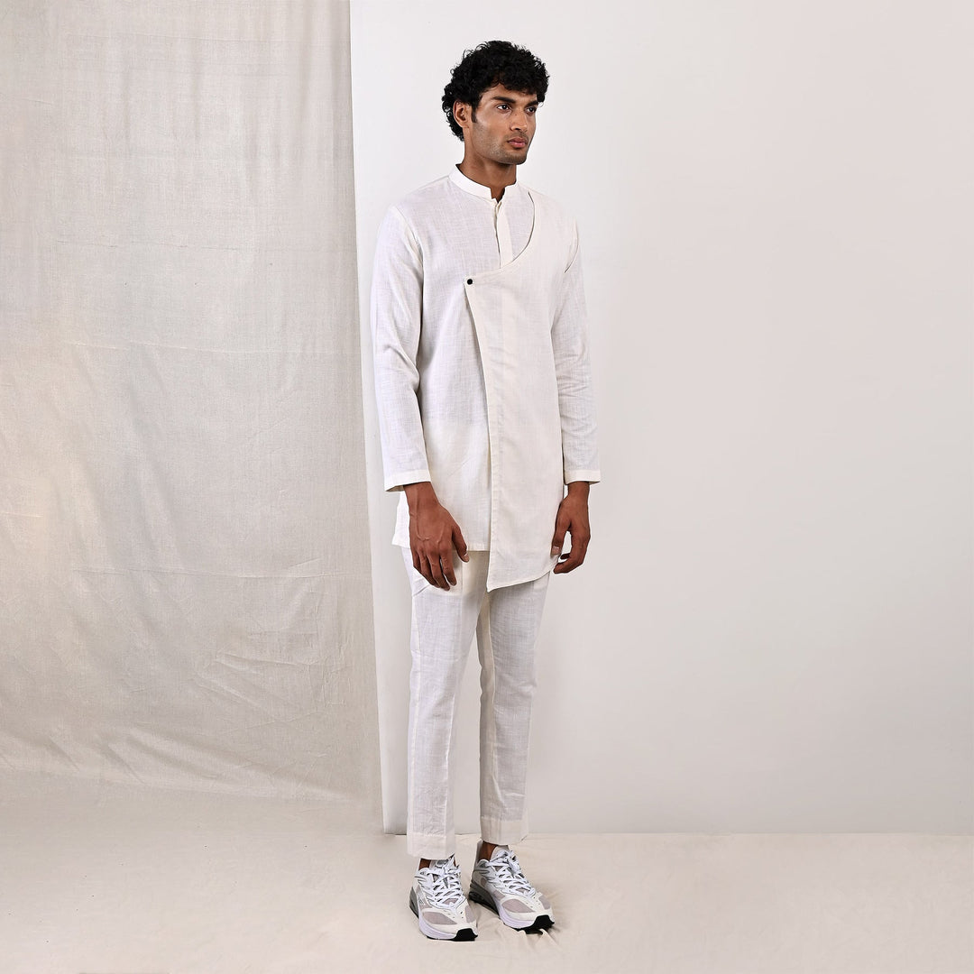 LAYNE - OFF WHITE NEHRU JACKET WITH ASYMMETRICAL OVERLAPPED KURTA SET - Bohame